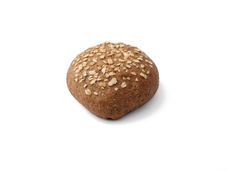 One round fresh bread bun with cereal strew