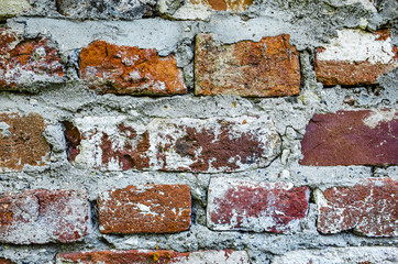 Decoration from the masonry of old brick on cement
