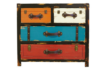 An antique wooden chest of drawers with leather handles, scratches and colored boxes.