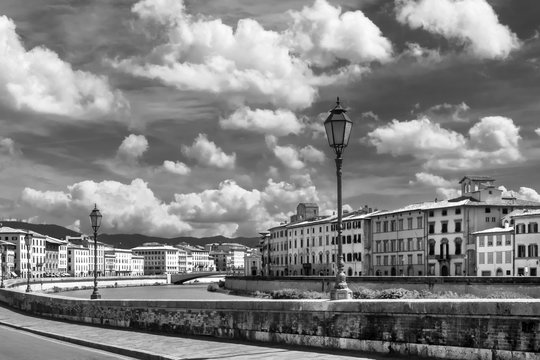 Black and white view of the beautiful sky over the historic center of Pisa, Tuscany, Italy