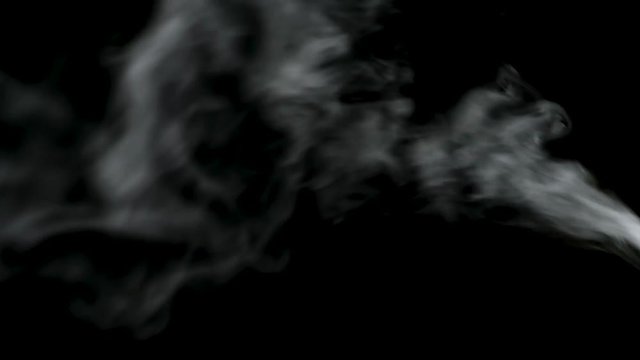 smoke coming from the right side against black background