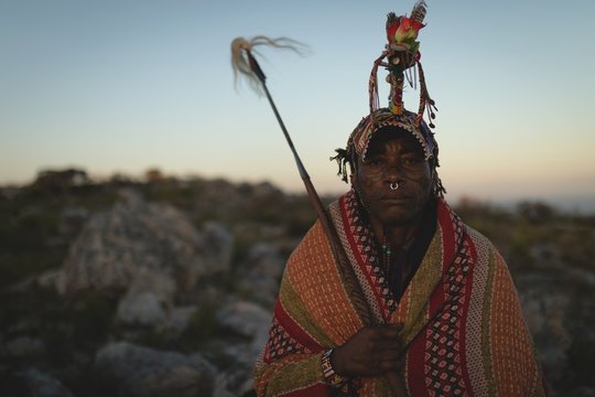 Maasai man standing at countryside