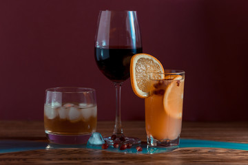 Alcohol drinks on dark solid background 