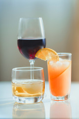 Alcohol drinks on light background 