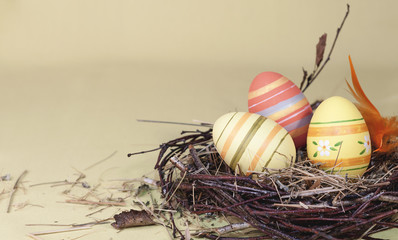 beautiful decorative Easter eggs in the nest
