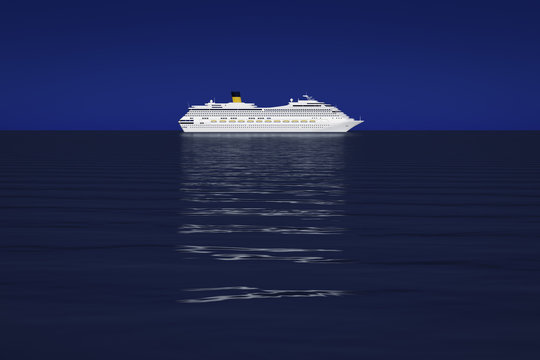 a bright white cruise ship in front of the dark blue sky