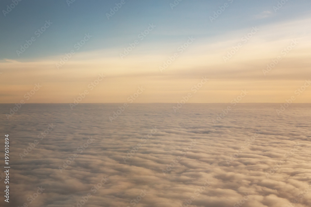 Aufkleber sunset above the clouds with copy space