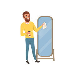 Young guy cleaning big bathroom mirror with rag and spraying detergent. Man doing housework. Flat vector design