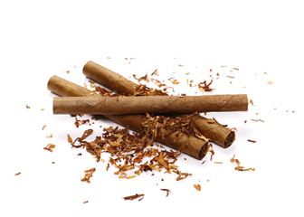 Cigarillos and tobacco pile isolated over white background