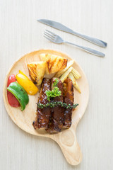 Rip barbecue with baby corn, bell pepper and pineapple grill.