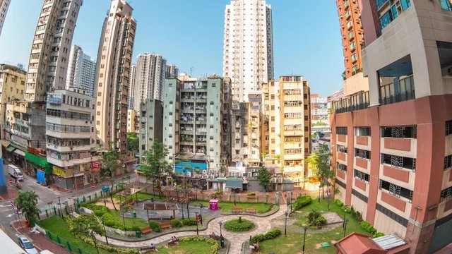 Fish eye view timelapse video of building and park in Yau Ma tei area in Kowloon Hong Kong, time lapse 4K