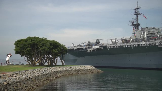Unconditional Surrender sculpture and a navy ship