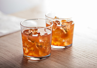 Fototapeta na wymiar Orange cold summer cocktail drink