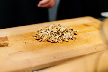 Raw walnuts on the cutting board