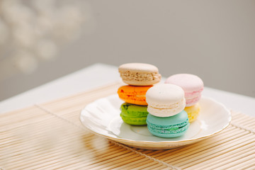 Delicious french dessert. Colorful pastel cake macaron or macaroon