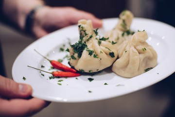 Fresh hot khinkali dumplings