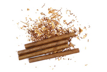 Cigarillos and tobacco pile isolated over white background, top view