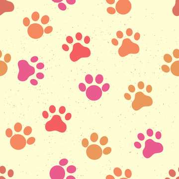 Seamless cat paws pattern on yellow background with grunge texture