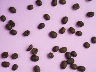 Coffe beans pattern on pink background