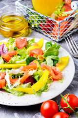 Fish salad with salmon and vegetables