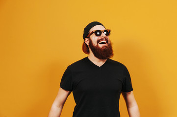Excited hipster man in sunglasses