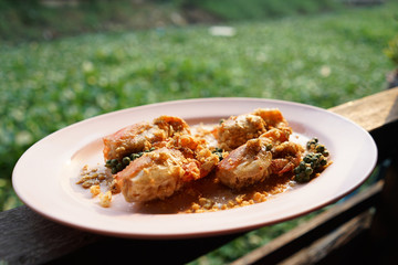 Fried river prawn with fresh pepper and garlic