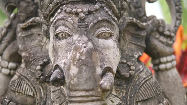 Statue of Hindu God - Ganesha. 4K Close Up, Slowmotion. Bali, Indonesia.