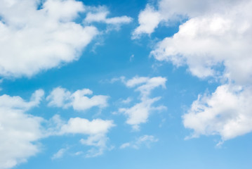 Naklejka na ściany i meble Photo of beautiful white clouds in a blue sky