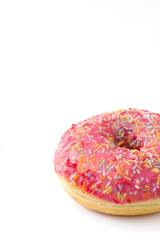 Pink frosted donut with colorful sprinkles isolated on white background. Copyspace