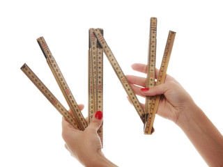 woman hand working with folding measure