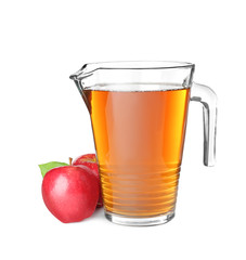 Jug with juice and fresh apples on white background