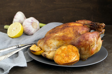Whole chicken fried with garlic and thyme.