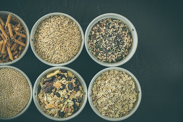 Quinoa, brown rice, seeds and oats . Whole grain and organic food concept for vegetarians