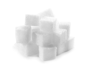 Pile of refined sugar cubes on white background
