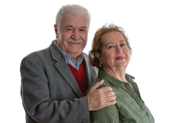 Studio portrait of cheerful senior couple