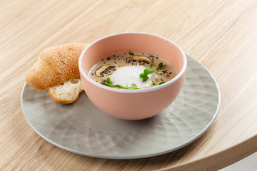 Mushroom cream soup and champignon in bowl