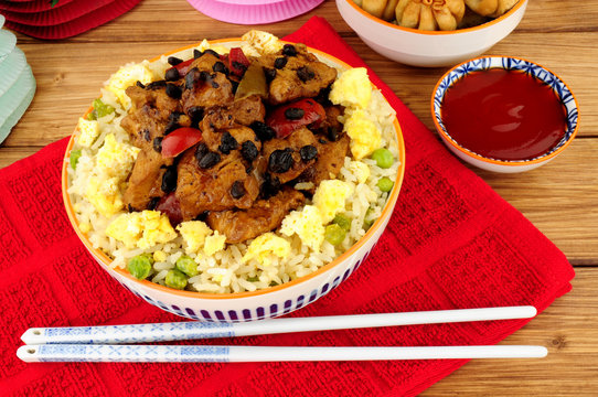 Chinese chicken and black bean sauce meal with egg fried rice