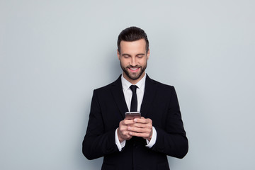 Portrait of cheerful excited joyful with toothy beaming smile banker entrepreneur freelancer teacher employee boss chief white shirt using telephone at work time isolated on gray background copyspace