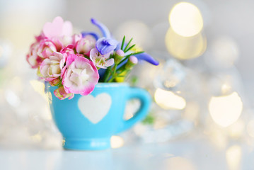 cup with flowers