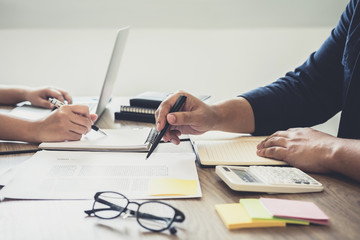 Young students campus or classmates with helps friend studying for a test an exam in workbook learning in classroom, Tutor books with friends, Education school concept