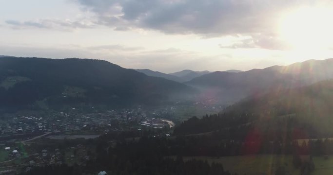 sunrise over the village in the mountains