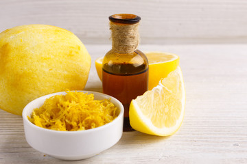 Lemon essential oil on a white background