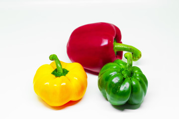 The colorful bell peppper with the white background , isolated style. 