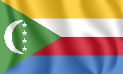 Flag of Comoros. Realistic waving flag of Union of the Comoros. Fabric textured flowing flag of Comoros.