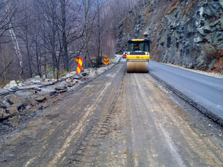 Obraz premium Road construction machinery in activity