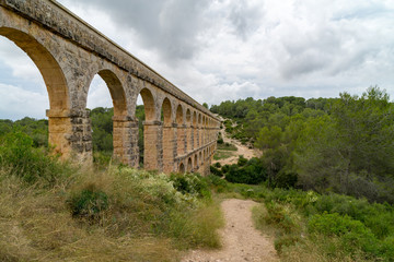 Obraz premium Roman Aqueduct Pont del Diable in Tarragona, Spain