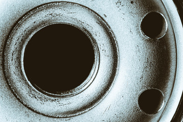 Monochrome background image of oil filter close up. Art macro photography of auto part.