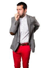 Handsome man coughing a lot on isolated background