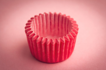 small cupcake tray holder on pink background