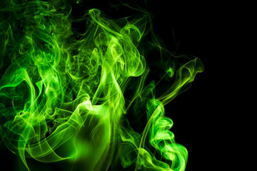 Green smoke on black background